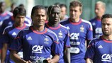 Florent Malouda (left) is growing into his role as France captain