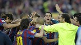 Barcelona players celebrate after the final whistle