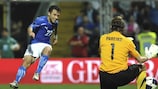 Giuseppe Rossi fires Italy's opening goal past Estonia goalkeeper Sergei Pareiko in Modena