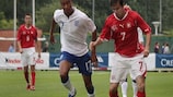 England's Jordan Obita vies for possession with Janick Kamber of Switzerland