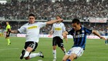 Inter's Yuto Nagatomo takes on former Cesena team-mate Luca Ceccarelli in a Serie A match