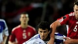 Hungary's Ákos Elek (right) tussles for possession with Roman Eremenko of Finland