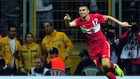 Burak Yılmaz wheels away in delight after breaking the deadlock against Azerbaijan