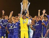 The Dynamo players celebrate with the silverware in Poltava