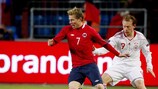 Norway's Bjørn Helge Riise looks to shake off Denmark's Michael Krohn-Dehli
