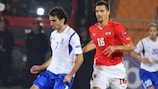 Azerbaijan's Vagif Javadov shields the ball from Austria's Paul Scharner