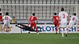 Malta goalkeeper Justin Haber saves a penalty
