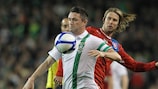 Ireland's Robbie Keane holds off Jaroslav Plašil of the Czech Republic