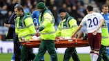 Darren Bent leaves the pitch on a stretcher against Wigan