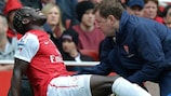Bacary Sagna receives treatment on the Arsenal Stadium pitch