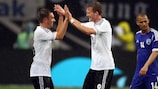 Philipp Lahm and André Schürrle celebrate Germany's second goal