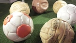 Old footballs at the ‘Football’s Technical Tricks' exhibition in Warsaw