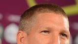 Bastian Schweinsteiger faces the media ahead of the semi-final with Italy