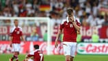 Nicklas Bendtner mostra a sua tristeza pela derrota por 2-1 contra a Alemanha