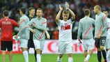 Jakub Błaszczykowski and the Poland players applaud the crowd following the draw with Russia