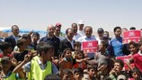 Michel Platini at the refugee camp in Jordan