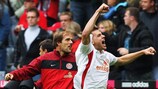 Mainz coach Thomas Tuchel and winning goalscorer Ádám Szalai celebrate victory in Munich