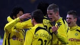Shinji Kagawa is mobbed after giving Borussia Dortmund the lead against Borussia Mönchengladbach