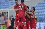 Kyle Casciaro is mobbed after scoring the only goal for Gibraltar against Malta