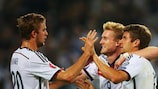 Müller magic sees Germany past battling Scots