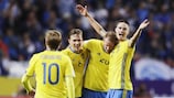 Sweden players celebrate Ola Toivonen's last-gasp winner at home to France
