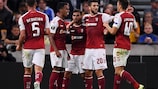 Ricardo Horta (centre) accepts the congratulations after scoring Braga's winner on matchday one