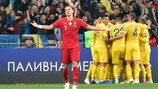 Portugal's defender Pepe reacts as Ukraine's players celebrate a goal during the Euro 2020 football qualification match between Ukraine and Portugal at the NSK Olimpiyskyi stadium in Kiev on October 14, 2019. (Photo by Genya SAVILOV / AFP) (Photo by GENYA SAVILOV/AFP via Getty Images)
