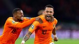 AMSTERDAM, NETERLANDS - MARCH 24: Memphis Depay of Netherlands celebrates after scoring his team's second goal with team mates during the 2020 UEFA European Championships group C qualifying match between Netherlands and Germany at Johan Cruijff ArenA on March 24, 2019 in Amsterdam, Netherlands. (Photo by TF-Images/Getty Images)