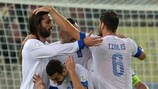 Greece celebrate Martin Škrtel's own goal