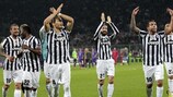 Jogadores da Juventus celebram qualificação para os quartos-de-final