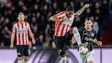 PSV's Pablo Rosario (left) tries to hold off Peter Michorl of LASK on Matchday 3
