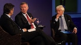 Sir Alex Ferguson pictured with UEFA chief technical officer Ioan Lupescu (left) and UEFA media officer Graham Turner during the question and answer session in Budapest