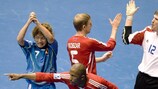 Russia's Pula, Pavel Kobzar and Sergey Zuev celebrate their win against Japan