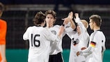 Sebastian Rudy, Mario Erb, Sascha Bigalke and captain Kevin Wolze celebrate Germany's win against the Netherlands
