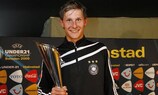 Benedikt Höwedes holds his Carlsberg Man of the Match trophy