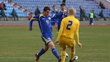 Pavel Shabalin (left) takes on the Sweden defence