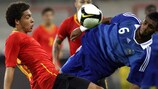 France's Yann M'Vila (right) competes with Axel Witsel