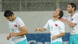Murat Ceylan is congratulated for his part in Turkey's first goal against Switzerland