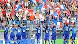 The victorious France team applaud their supporters in Caen after edging past Croatia