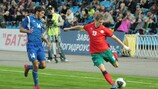 Belarus scorer Pavel Nekhaychik (right) looks to get in a cross under pressure from Bakhtiyar Soltanov of Azerbaijan