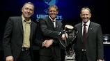 Tournament ambassador Flemming Povlsen (centre) poses with the trophy at the draw