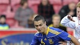 Denmark's Anders Christiansen (right) competes for possession with Ukraine's Vitaliy Vitsenets during their friendly