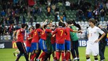 Spain celebrate their victory at the final whistle