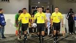 Polish referee Pawel Gil (centre) at the Under-19 finals