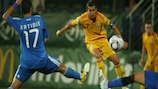 Romania's Ionuţ Năstăsie has an attempt on goal during his side's defeat by Greece