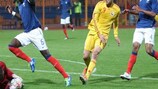 France goalkeeper Ali Ahamada foils George Ţucudean