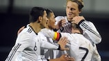 Germany Under-19 striker Philipp Hofmann is mobbed after scoring against Northern Ireland