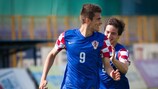 Marko Dugandžić celebrates scoring against Austria