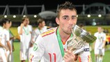 Paco Alcácer celebrates with the trophy after scoring twice in last year's final