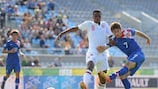 England goalscorer Nathaniel Chalobah attempts to challenge Marko Pajač of Croatia
